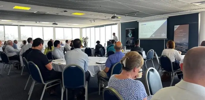 People in a conference room for Sunshine Coast Council Geospatial Intelligence 'Centre of Excellence' ideation